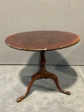 Antique Tilt-Top Table, 34 inches in diameter, Dark Finish, Three Feet, shows some wear