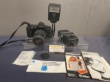 Minolta Maxxum 3xi Camera w/ AF Zoom 70-210mm Lens, Auto 2600 & 283 Auto Thyristor w/ Manuals
