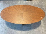 Vintage Mid Century Modern Oval Wood Finish Coffee Table. Measures 47