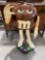 Brown M&M Candy Plastic Store Rolling Display Stand. Good Condition. See pics.