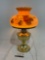 Vintage Electrified Hurricane Lamp, brass Base, Rose patterned pale orange shade, tested & working