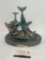 Bronze Statue w/ Stone Base, titled Cradle of the Sea by J Wyatt, 11h x 12w x 9d inches