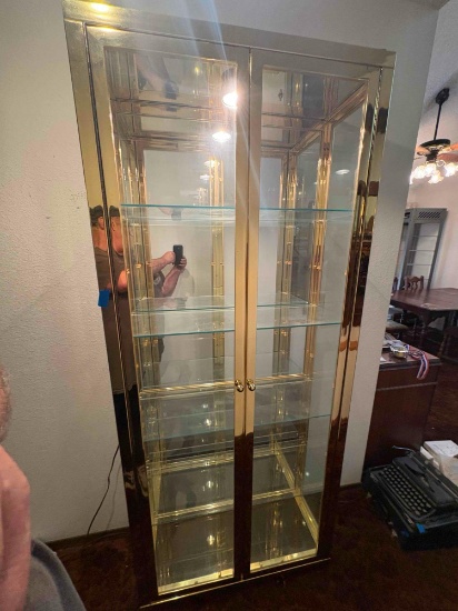 Lighted 4 shelf Glass display cabinet w/ gold trim tested works may need a light bulb.