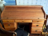 Full size Pine ? roll top desk in good condition comes w/ antique rolling office chair