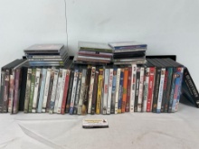 Assortment of 40+ DVDs & 15 CDs, some wear on the covers