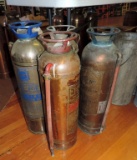 Four Cooper Fire Extinguishers