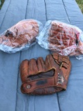 2 New Leather Gloves & One Old Style Glove