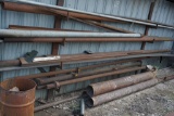 PIPE RACK & CONTENTS ON WALL