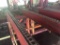 Mellott 11' x 39' 4-strand log infeed deck w/ hydraulic stop & load & elect