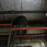 (4) USED TIRES ON TOP RACK