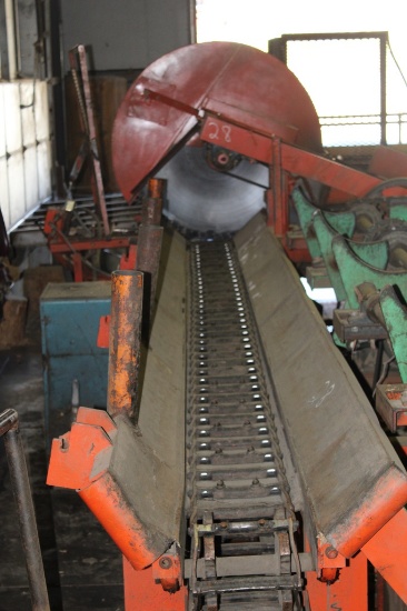 CMC FIREWOOD PROCESSOR THAT WAS USED TO CUT LOG TO LENGTH HAS 19' INFEED, 52" SAW, 6 WAY SPLITTER, A