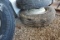 USED 295/75R22.5 TIRE MOUNTED ON STEEL RIM