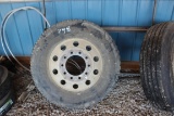 USED 11R22.5 TIRE MOUNTED ON ALUM RIM