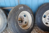 NEW 11R22.5 TIRE MOUNTED ON STEEL RIM