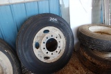NEW 11R22.5 TIRE MOUNTED ON STEEL RIM