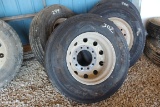 NEW 11R22.5 TIRE MOUNTED ON STEEL RIM