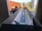 19inch X 27ft Rubber Belt Log Conveyor (Into Chipper), Located in Ashland, WI