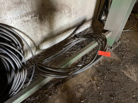 All Flex Conduit, Misc Chain Bolts, Air Hose (On South Wall Of Debarker Room)