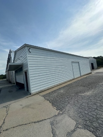 Modular Aluminum Building 30ft x 60ft x 14ft (Houses Lot 113), (2) 18ft and (1) 10ft Garage Doors. L