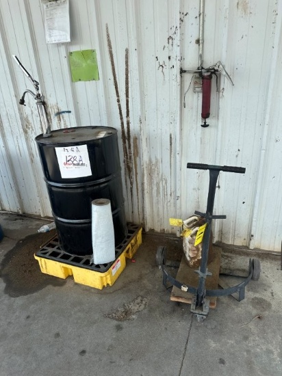 55 Gallon Drum of SAE 30W Engine Oil with Hand Pump and Spill Containment Platform Approx 75% Full.
