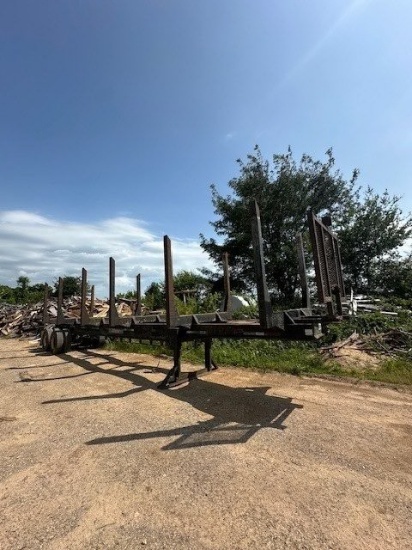 PITTS 6 Bunk 40ft Tandem Axle Log Trailer. NOTE: ID TAG# 525A. Located at 361 Yarbrough Ln., Winches