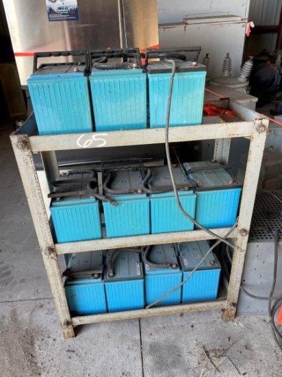 Rack of used batteries
