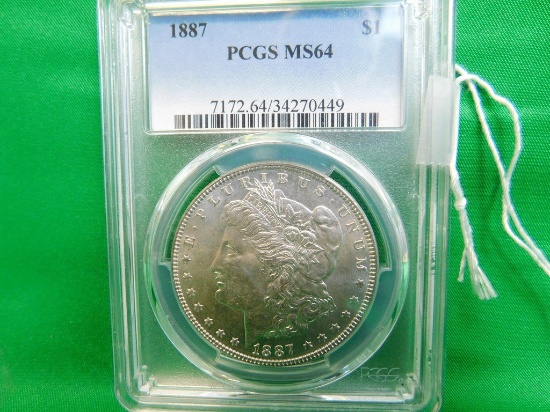 GRADED 1887 MORGAN SILVER DOLLAR