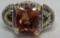 18KT GOLD IMPERIAL TOPAZ AND DIAMOND RING