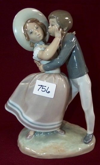 9" TALL LLADRO BOY TRYING TO KISS A GIRL WEARING HAT