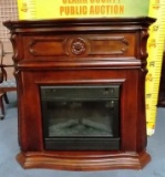 MANTLED FIREPLACE W/ HEATER