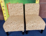 UPHOLSTERED PAIR OF ARMLESS CHAIRS