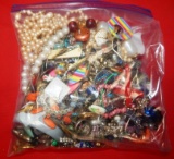 4 POUND BAG OF ASSORTED COSTUME JEWELRY