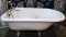 CAST IRON WHITE TUB WITH FIXTURES