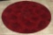 5 FOOT ROUND RED AREA RUG IN EXCELLENT CONDITION
