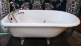 CAST IRON WHITE TUB WITH FIXTURES