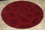 5 FOOT ROUND RED AREA RUG IN EXCELLENT CONDITION