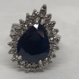 14KT GOLD BLUE SAPPHIRE AND DIAMOND RING