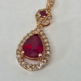 14KT ROSE GOLD RUBY AND DIAMOND PENDANT AND EARRINGS SET