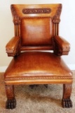 ANTIQUE LEATHER & OAK ORNATE ARM CHAIR