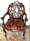 ANTIQUE AMERICAN OAK CHAIR WITH RED/GOLD PRINT ON CASTERS