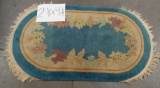 2 1/2' BY 4 1/2' HAND MADE OVAL BLUE AREA RUG