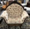 MAHOGANY CARVED FRAMED CHAIR W/ TUFTED FLORAL PRINT