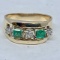14KT YELLOW GOLD .30CTS EMERALD AND .35CTS DIAMOND RING
