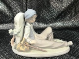 BOY SITTING WITH BAT LLADRO