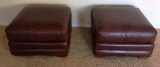 PAIR OF LEATHER BURGUNDY OTTOMANS