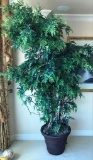 LARGE NEVER DIE TREE WITH BROWN PLANTER STAND