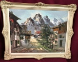 1960'S SIGNED FRAMED CANVAS ARTWORK - VILLAGE & MOUNTAINS