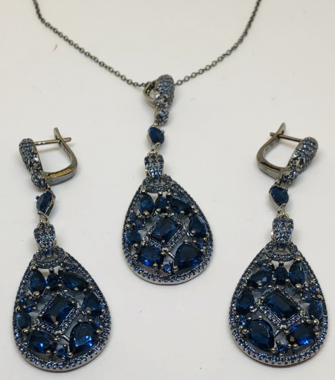 STERLING SILVER PENDANT AND EARRINGS SET WITH BLUE STONE