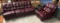 TWO PIECE BURGUNDY LEATHER TUFTED SOFA & CHAIR