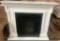 WHITE COLOR FIREPLACE MANTLE W/ HEATER OR JUST FOR DCOR PURPOSE